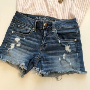 Distressed denim shorts